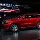Jim Morrison, director of Jeep’s brand product marketing, unveils the Grand Cherokee SRT.